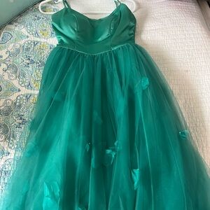 Green prom dress in size 6, long enough for 5’9” with flower detailing on skirt